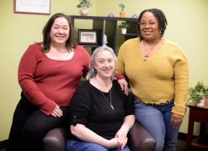 Traci, Dr. Shelley, and Sable, the staff of Cuyahoga Chiropractic